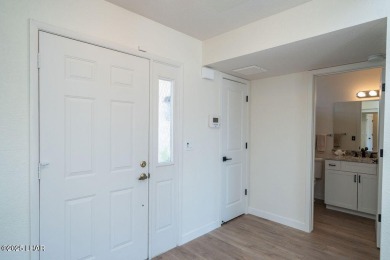 VERY clean 2-bedroom, 2-bathroom home with a versatile den! This on London Bridge Golf Course in Arizona - for sale on GolfHomes.com, golf home, golf lot