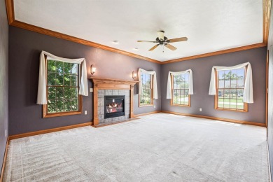 Set in a highly desirable neighborhood near the golf course on Hart Ridge Golf Course in Iowa - for sale on GolfHomes.com, golf home, golf lot