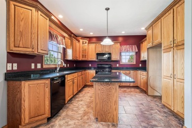 Set in a highly desirable neighborhood near the golf course on Hart Ridge Golf Course in Iowa - for sale on GolfHomes.com, golf home, golf lot