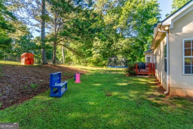 Nestled right off the 13th hole of the White Oak Golf Course on Canongate On White Oak Golf Course in Georgia - for sale on GolfHomes.com, golf home, golf lot