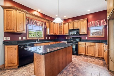 Set in a highly desirable neighborhood near the golf course on Hart Ridge Golf Course in Iowa - for sale on GolfHomes.com, golf home, golf lot