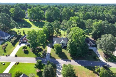 Nestled right off the 13th hole of the White Oak Golf Course on Canongate On White Oak Golf Course in Georgia - for sale on GolfHomes.com, golf home, golf lot