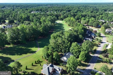 Nestled right off the 13th hole of the White Oak Golf Course on Canongate On White Oak Golf Course in Georgia - for sale on GolfHomes.com, golf home, golf lot