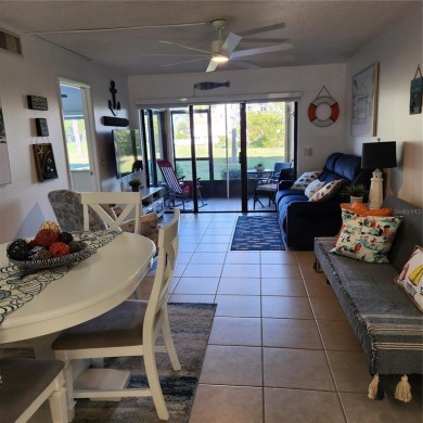 NON FLOODED 1st FLOOR WATERFRONT VILLA IN ISLA DEL SOL*** This on Isla Del Sol Yacht and Country Club in Florida - for sale on GolfHomes.com, golf home, golf lot