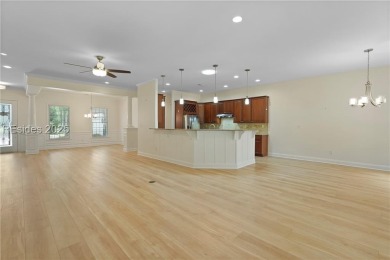 This spacious Lowcountry home in Riverton Pointe offers an open on Hampton Pointe Golf Course in South Carolina - for sale on GolfHomes.com, golf home, golf lot