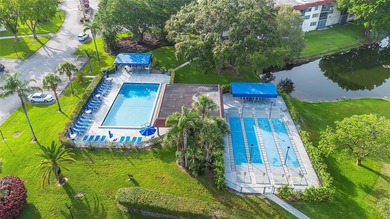 Located directly across from the pool. Six-unit building - small on Hollybrook Golf and Tennis Club  in Florida - for sale on GolfHomes.com, golf home, golf lot