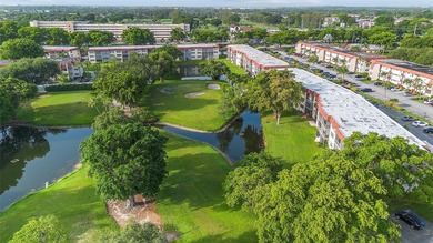 Located directly across from the pool. Six-unit building - small on Hollybrook Golf and Tennis Club  in Florida - for sale on GolfHomes.com, golf home, golf lot