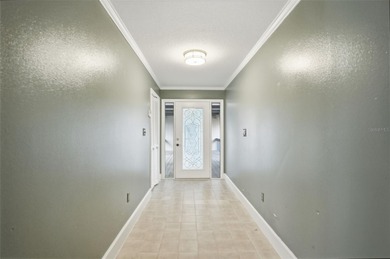 One or more photo(s) has been virtually staged. Beautiful Custom on Brooksville Country Club At Majestic Oaks in Florida - for sale on GolfHomes.com, golf home, golf lot