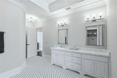 Discover the epitome of luxury and elegance in the gated TPC on TPC At Sugarloaf Golf Club in Georgia - for sale on GolfHomes.com, golf home, golf lot