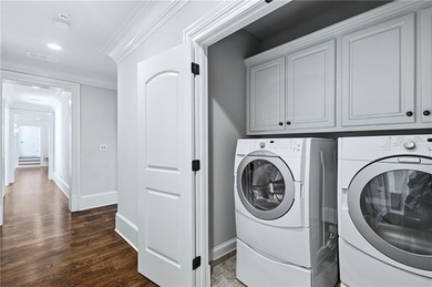 Discover the epitome of luxury and elegance in the gated TPC on TPC At Sugarloaf Golf Club in Georgia - for sale on GolfHomes.com, golf home, golf lot