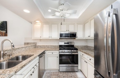 Welcome to this beautifully maintained condo overlooking the on Sugar Mill Country Club in Florida - for sale on GolfHomes.com, golf home, golf lot