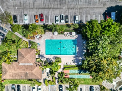 Welcome to this beautifully updated 2-bedroom, 2-bathroom condo on Palm-Aire Country Club and Resort - Palms in Florida - for sale on GolfHomes.com, golf home, golf lot