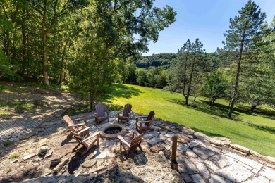 Nestled amidst the scenic beauty of mature trees and lush on Eagle Ridge Inn and Resort in Illinois - for sale on GolfHomes.com, golf home, golf lot