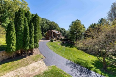 Nestled amidst the scenic beauty of mature trees and lush on Eagle Ridge Inn and Resort in Illinois - for sale on GolfHomes.com, golf home, golf lot