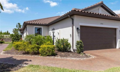Welcome to effortless luxury in the heart of the sought after on Esplanade Golf and Country at Lakewood Ranch in Florida - for sale on GolfHomes.com, golf home, golf lot