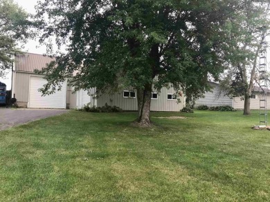 Welcome to 304 1st St, Elma, IA 50658--a gem nestled right next on Maple Heights Golf and Country Club in Iowa - for sale on GolfHomes.com, golf home, golf lot
