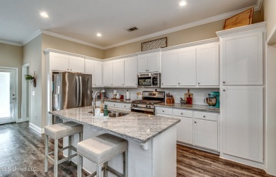 A must see!   Beautiful finishes throughout this unique floor on Patrick Farms Golf Club in Mississippi - for sale on GolfHomes.com, golf home, golf lot