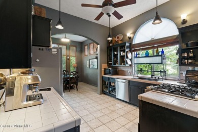 Discover your dream home in this expansive 4,120 SF residence on Trailhead At Liberty Lake in Washington - for sale on GolfHomes.com, golf home, golf lot