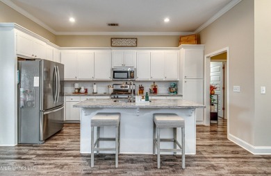 A must see!   Beautiful finishes throughout this unique floor on Patrick Farms Golf Club in Mississippi - for sale on GolfHomes.com, golf home, golf lot