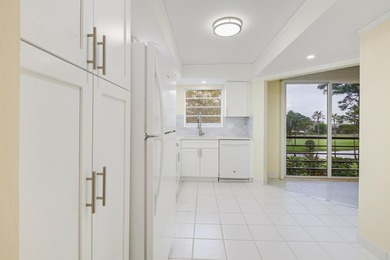 WELCOME TO THIS SPARKLING, UPDATED CONDO WITH BEAUTIFUL GOLF & on Poinciana Golf Club in Florida - for sale on GolfHomes.com, golf home, golf lot