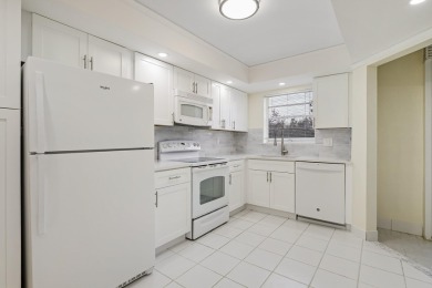 WELCOME TO THIS SPARKLING, UPDATED CONDO WITH BEAUTIFUL GOLF & on Poinciana Golf Club in Florida - for sale on GolfHomes.com, golf home, golf lot
