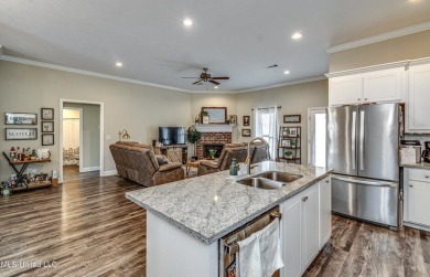 A must see!   Beautiful finishes throughout this unique floor on Patrick Farms Golf Club in Mississippi - for sale on GolfHomes.com, golf home, golf lot