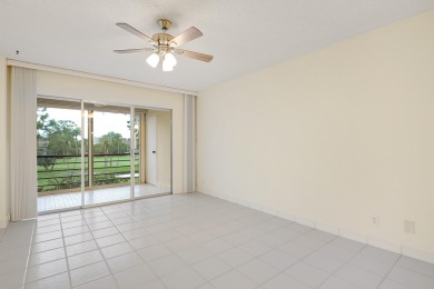 WELCOME TO THIS SPARKLING, UPDATED CONDO WITH BEAUTIFUL GOLF & on Poinciana Golf Club in Florida - for sale on GolfHomes.com, golf home, golf lot