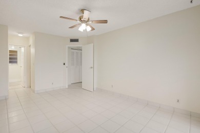 WELCOME TO THIS SPARKLING, UPDATED CONDO WITH BEAUTIFUL GOLF & on Poinciana Golf Club in Florida - for sale on GolfHomes.com, golf home, golf lot