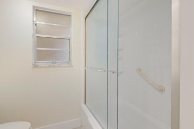 WELCOME TO THIS SPARKLING, UPDATED CONDO WITH BEAUTIFUL GOLF & on Poinciana Golf Club in Florida - for sale on GolfHomes.com, golf home, golf lot