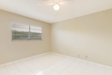 WELCOME TO THIS SPARKLING, UPDATED CONDO WITH BEAUTIFUL GOLF & on Poinciana Golf Club in Florida - for sale on GolfHomes.com, golf home, golf lot