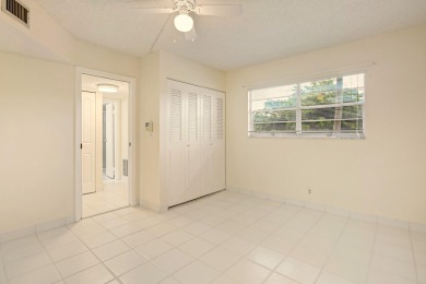WELCOME TO THIS SPARKLING, UPDATED CONDO WITH BEAUTIFUL GOLF & on Poinciana Golf Club in Florida - for sale on GolfHomes.com, golf home, golf lot