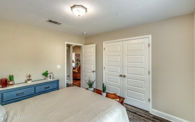 A must see!   Beautiful finishes throughout this unique floor on Patrick Farms Golf Club in Mississippi - for sale on GolfHomes.com, golf home, golf lot