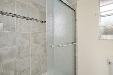 WELCOME TO THIS SPARKLING, UPDATED CONDO WITH BEAUTIFUL GOLF & on Poinciana Golf Club in Florida - for sale on GolfHomes.com, golf home, golf lot