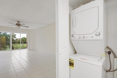 WELCOME TO THIS SPARKLING, UPDATED CONDO WITH BEAUTIFUL GOLF & on Poinciana Golf Club in Florida - for sale on GolfHomes.com, golf home, golf lot