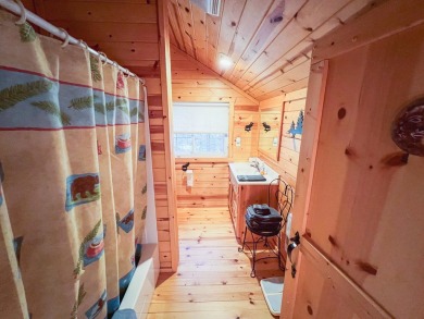 Charming 2BR/3BA year-round lakefront home on full rec Wheeler on McCauslin Brook Golf and Country Club in Wisconsin - for sale on GolfHomes.com, golf home, golf lot
