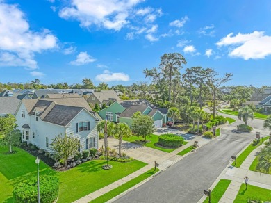 Welcome to this stunning home located in the prestigious gated on Surf Golf and Beach Club in South Carolina - for sale on GolfHomes.com, golf home, golf lot