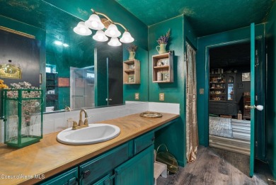 Discover your dream home in this expansive 4,120 SF residence on Trailhead At Liberty Lake in Washington - for sale on GolfHomes.com, golf home, golf lot