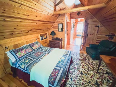 Charming 2BR/3BA year-round lakefront home on full rec Wheeler on McCauslin Brook Golf and Country Club in Wisconsin - for sale on GolfHomes.com, golf home, golf lot