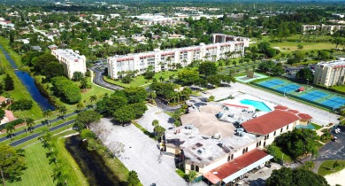 WELCOME TO THIS SPARKLING, UPDATED CONDO WITH BEAUTIFUL GOLF & on Poinciana Golf Club in Florida - for sale on GolfHomes.com, golf home, golf lot