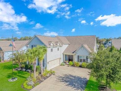 Welcome to this stunning home located in the prestigious gated on Surf Golf and Beach Club in South Carolina - for sale on GolfHomes.com, golf home, golf lot