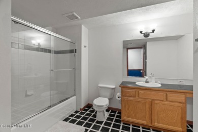 Discover your dream home in this expansive 4,120 SF residence on Trailhead At Liberty Lake in Washington - for sale on GolfHomes.com, golf home, golf lot