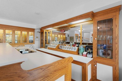 Charming 2BR/3BA year-round lakefront home on full rec Wheeler on McCauslin Brook Golf and Country Club in Wisconsin - for sale on GolfHomes.com, golf home, golf lot