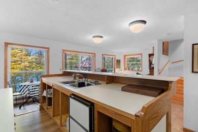 Charming 2BR/3BA year-round lakefront home on full rec Wheeler on McCauslin Brook Golf and Country Club in Wisconsin - for sale on GolfHomes.com, golf home, golf lot