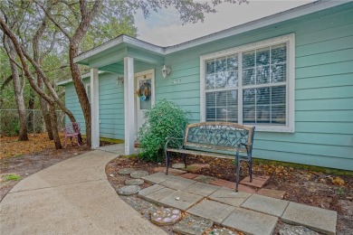 Nestled beneath large shade oak trees, this fully furnished on Rockport Country Club in Texas - for sale on GolfHomes.com, golf home, golf lot