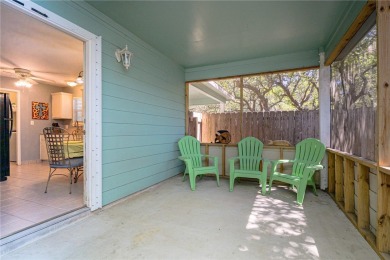 Nestled beneath large shade oak trees, this fully furnished on Rockport Country Club in Texas - for sale on GolfHomes.com, golf home, golf lot