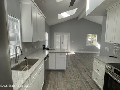 A newly constructed custom home with a detached garage awaits on Willow Lakes RV and Golf Resort in Florida - for sale on GolfHomes.com, golf home, golf lot