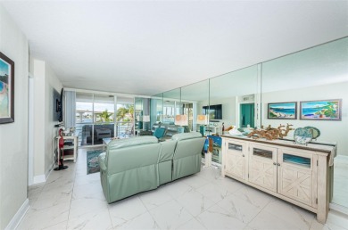 MILLION DOLLAR VIEW.. PRIVATE COMMUNITY BEACH.. FULLY UPDATED on Isla Del Sol Yacht and Country Club in Florida - for sale on GolfHomes.com, golf home, golf lot