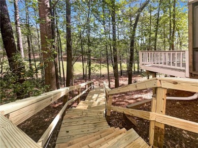 Welcome to this stunning 4-bedroom, 3.5-bath Woodstock home that on Canongate At Eagle Watch Golf Club in Georgia - for sale on GolfHomes.com, golf home, golf lot