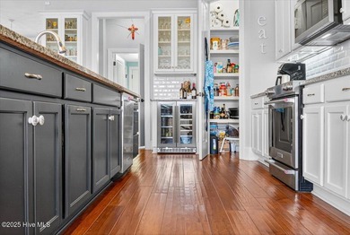 This stunning Creekside home offers front-row views of the on Crow Creek Golf Club in North Carolina - for sale on GolfHomes.com, golf home, golf lot