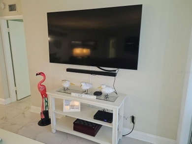 MILLION DOLLAR VIEW.. PRIVATE COMMUNITY BEACH.. FULLY UPDATED on Isla Del Sol Yacht and Country Club in Florida - for sale on GolfHomes.com, golf home, golf lot